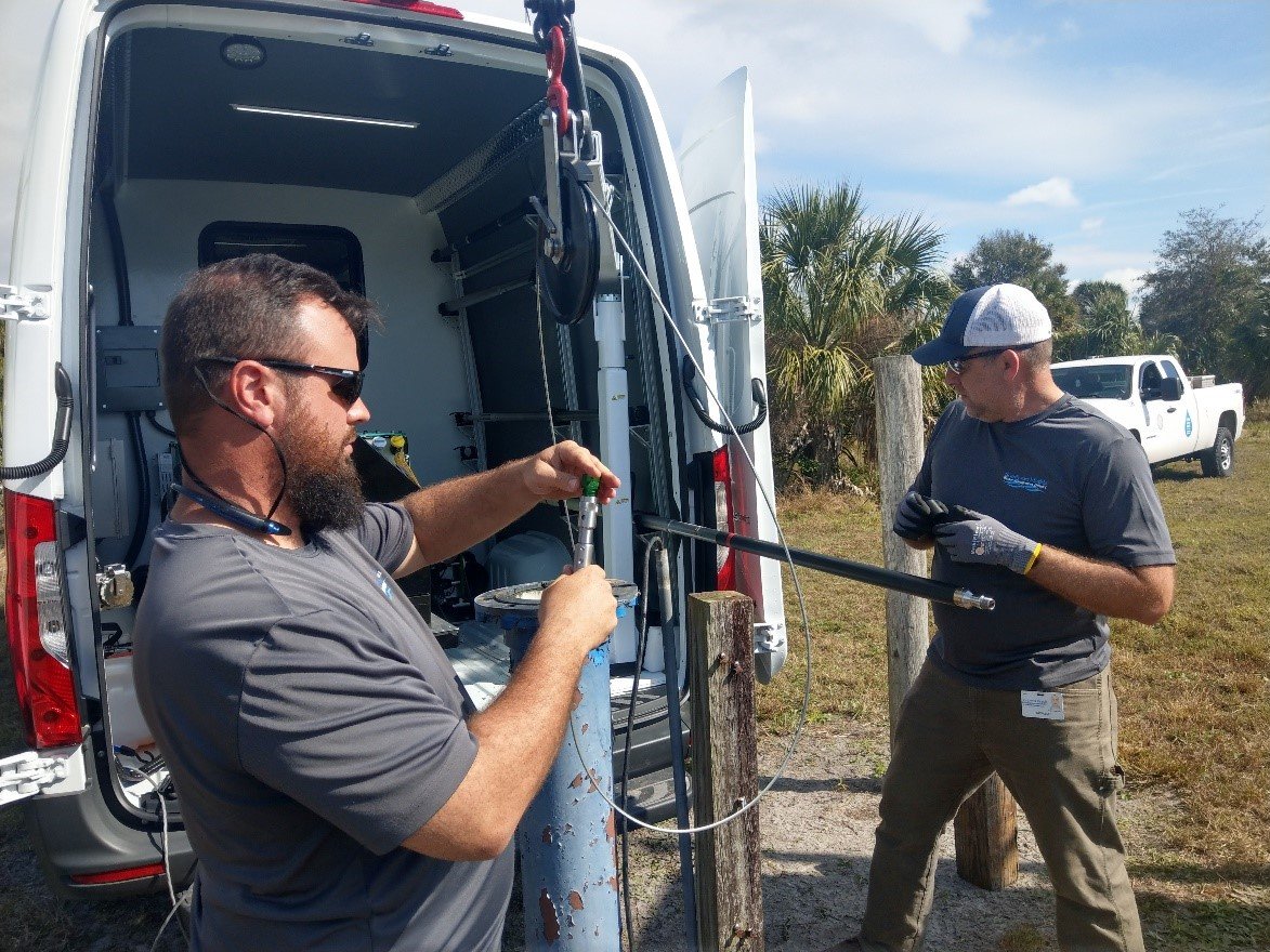 Readying cablehead to connect Gamma sonde geophysical logging